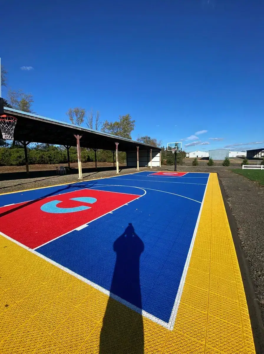 Backyard Family Court after the build, surfaced with modular court tiles